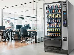Which is the Best Option: Buy, Rent, or Franchise a Vending Machine? Vending machine in office